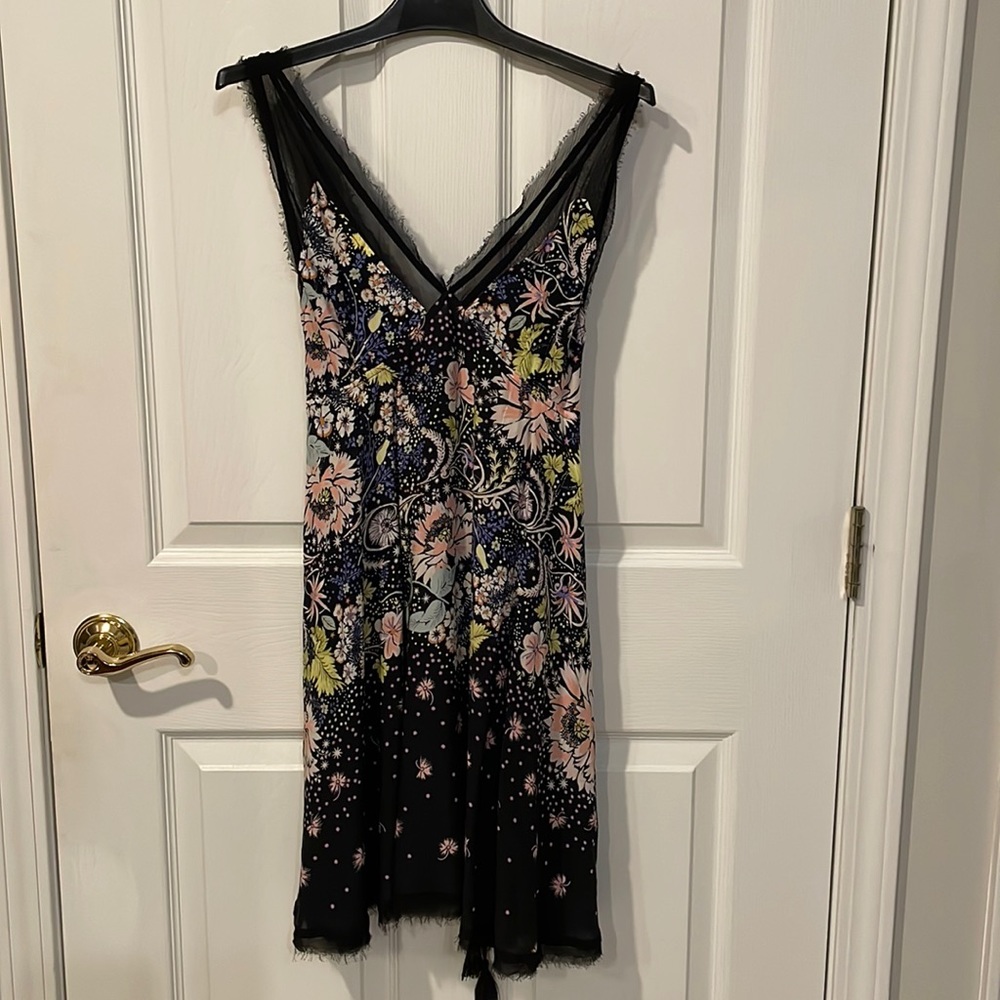 Free People spring/summer dress with back tie string. No size tag fits Small/XS